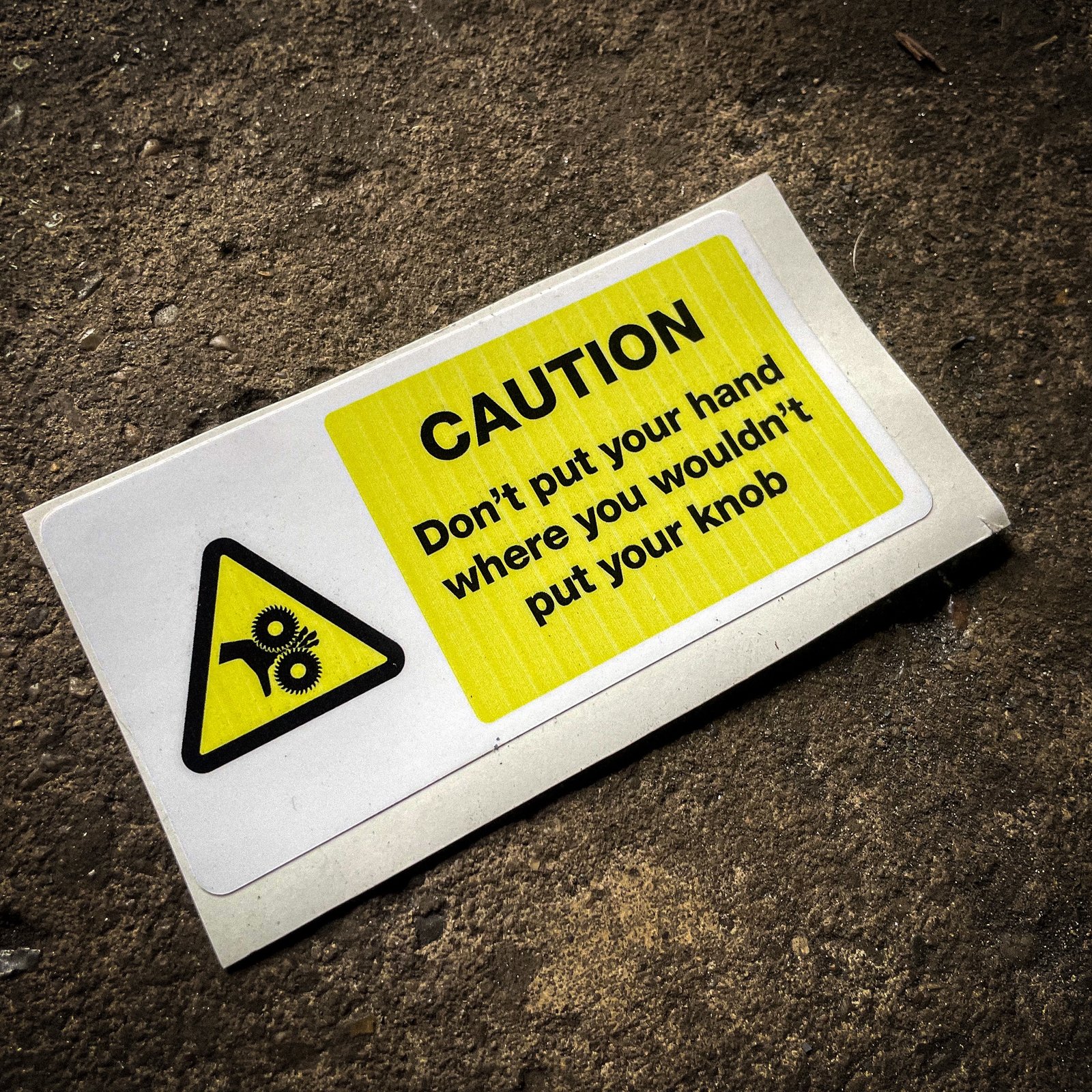 Funny "safety" sticker - CAUTION: Don't put your hand where you wouldn't put your knob
