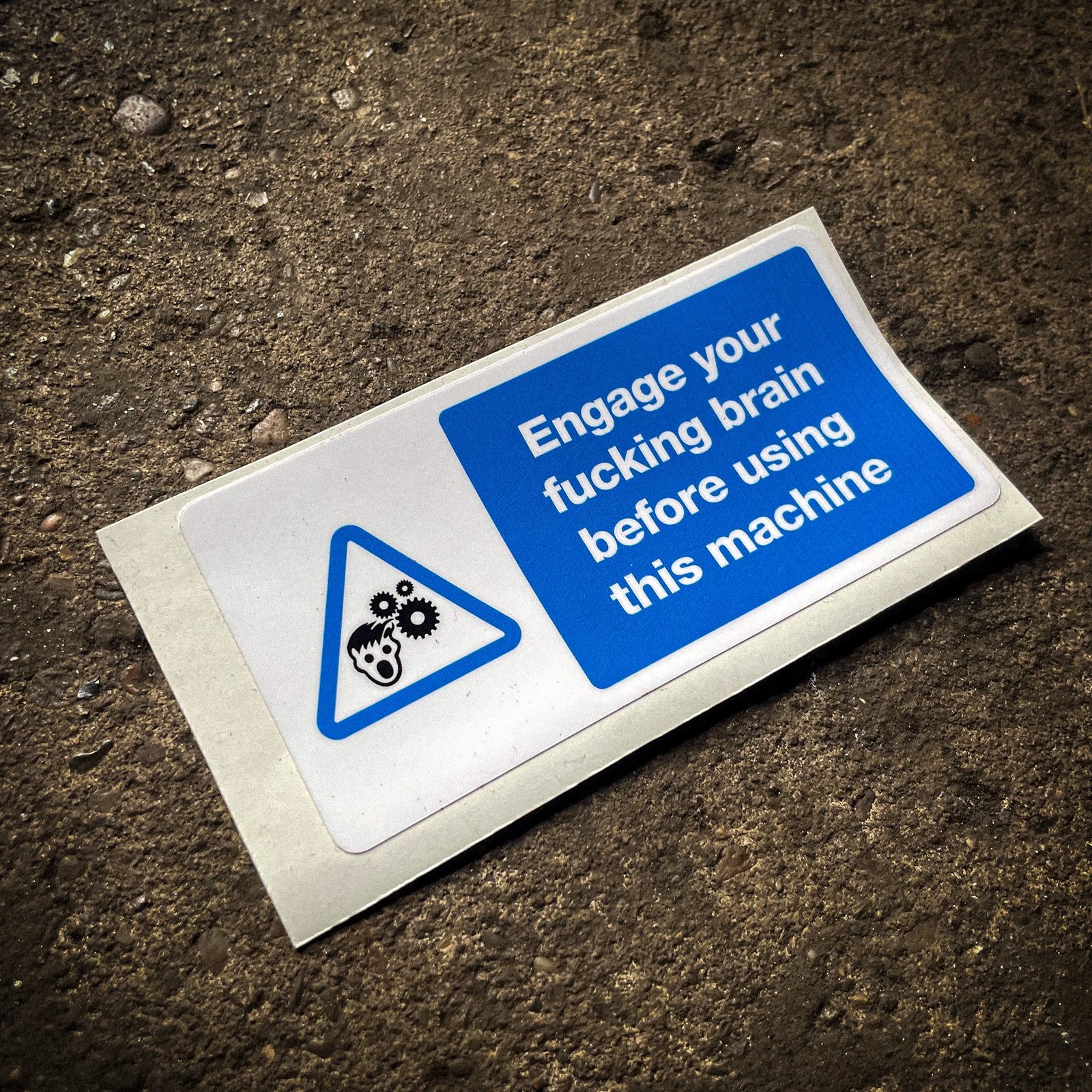 Funny "safety" sticker - Engage your fucking brain before using this machine