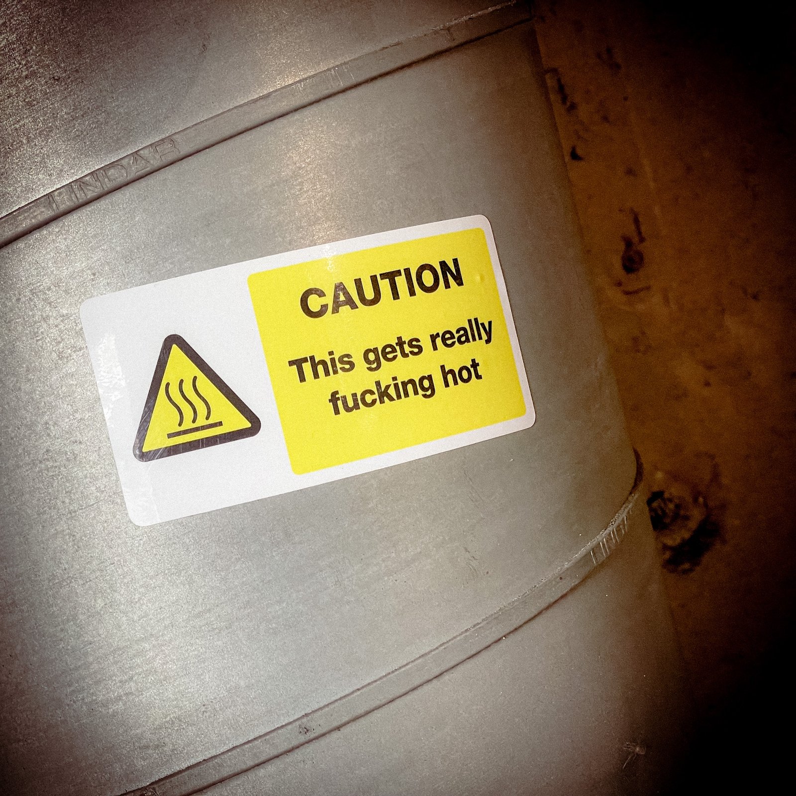 Funny "safety" sticker - CAUTION: This gets really fucking hot