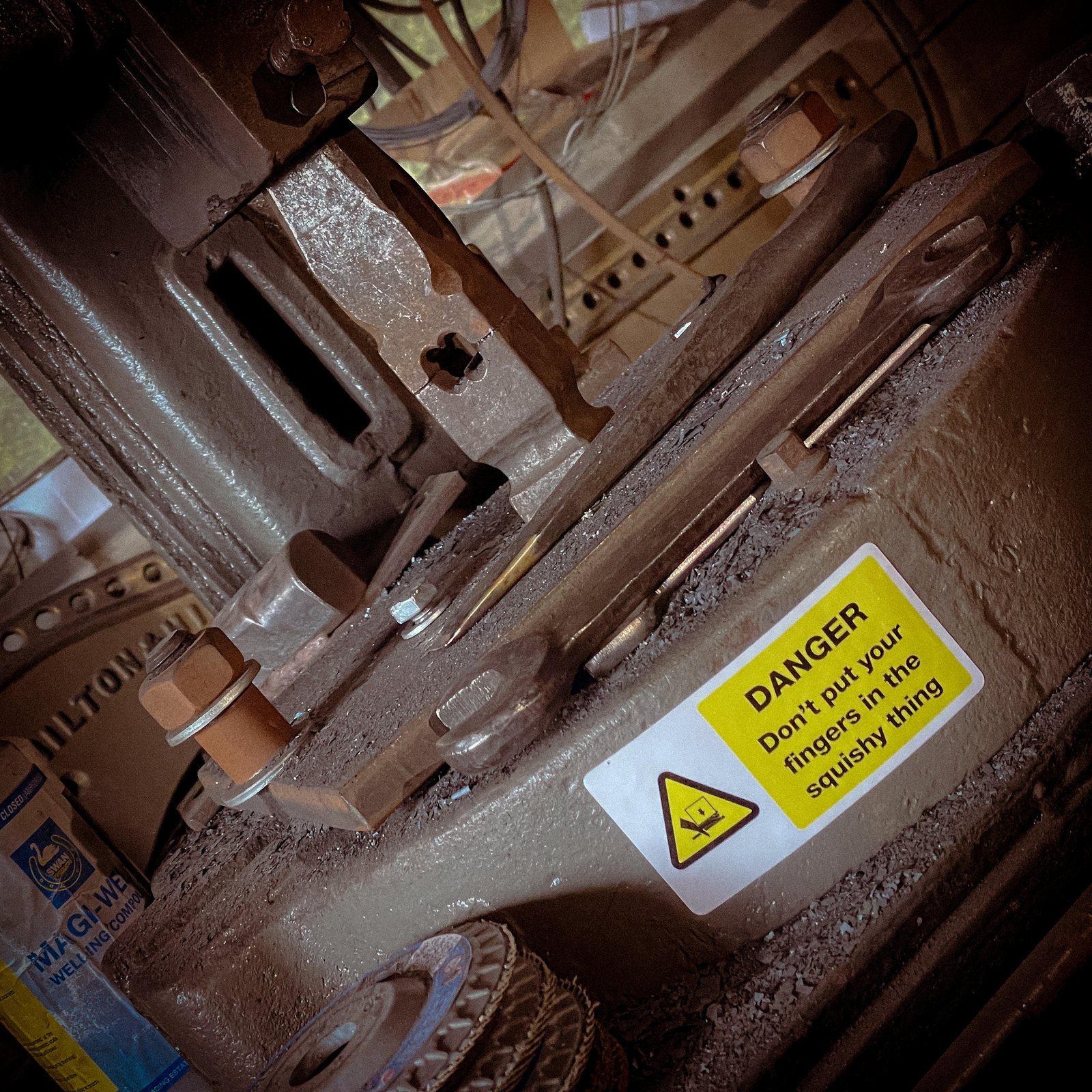 Funny "safety" sticker - DANGER: Don't put your fingers in the squishy thing