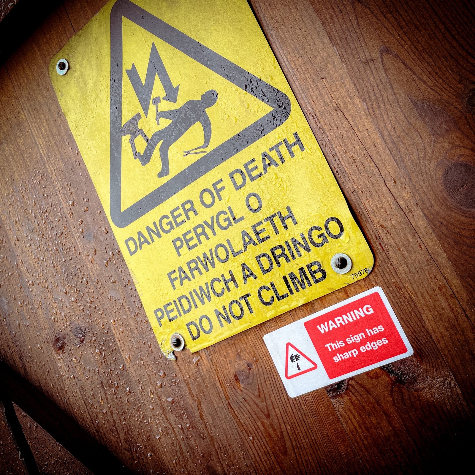 Funny "safety" sticker - WARNING: This sign has sharp edges