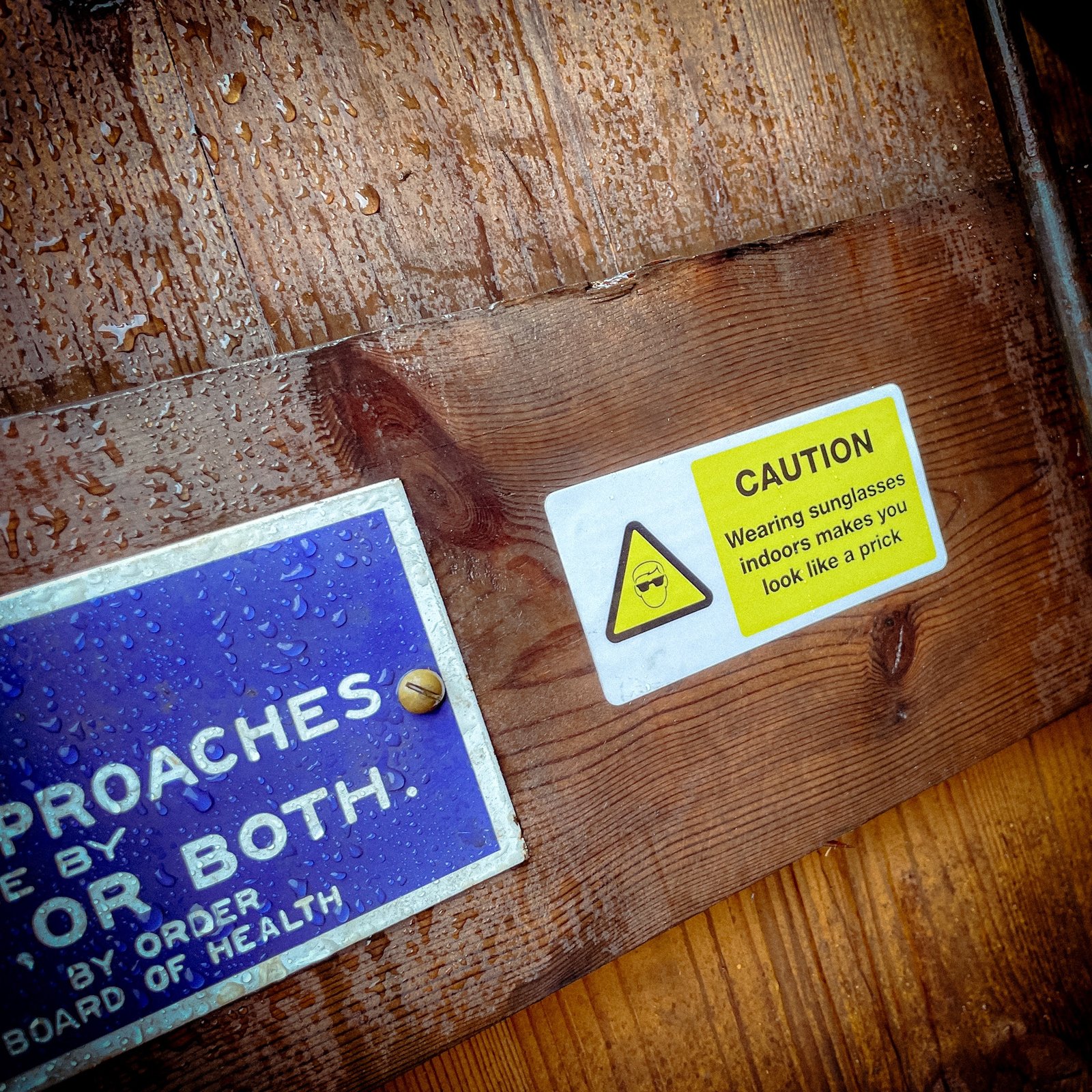 Funny "safety" sticker - CAUTION: wearing sunglasses indoors makes you look like a prick